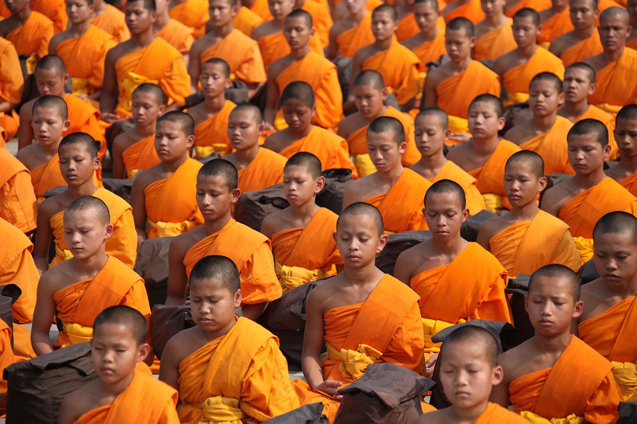 Young Buddhist Monks Meditating